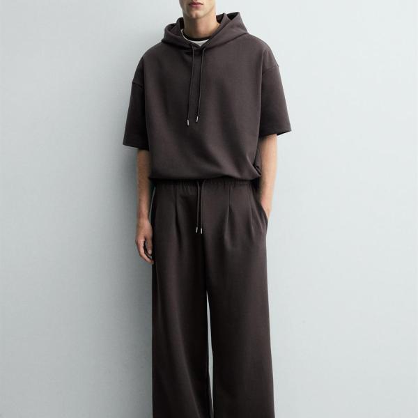 INTERLOCK PLEATED LABEL TROUSERS